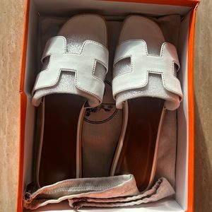 White Designer Slides Size 11 (fits size 9, maybe 10) in perfect condition